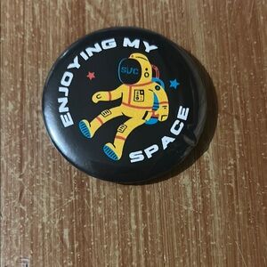 Black Button with Astronaut Design